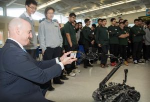 Principal John Colton sets up his Iphone on the new Explosive Disposal Unit built by ICOR Technology