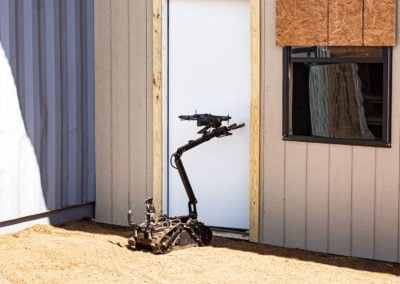 Mini-CALIBER® CARRYING DRONE THROUGH DOOR